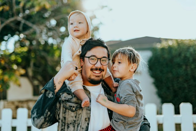 Man with two younger children